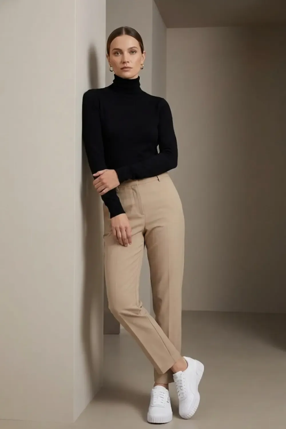 Minimalist woman in relaxed office style with Puma Cali sneakers