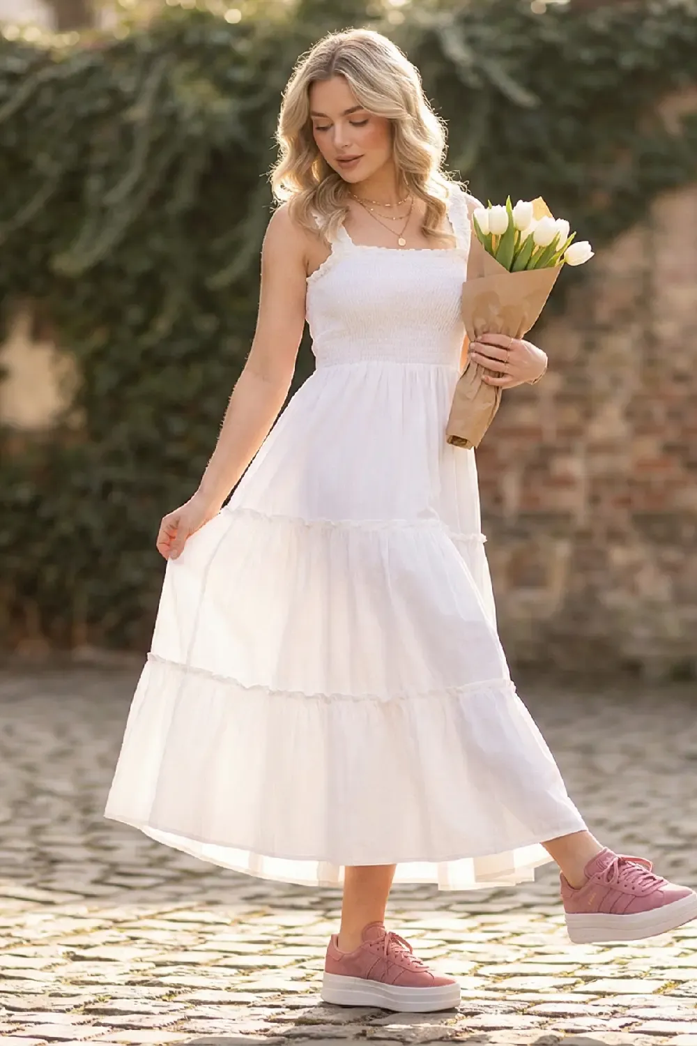 A woman portraying a soft, feminine version of the Scandi look, emphasizing texture and height.