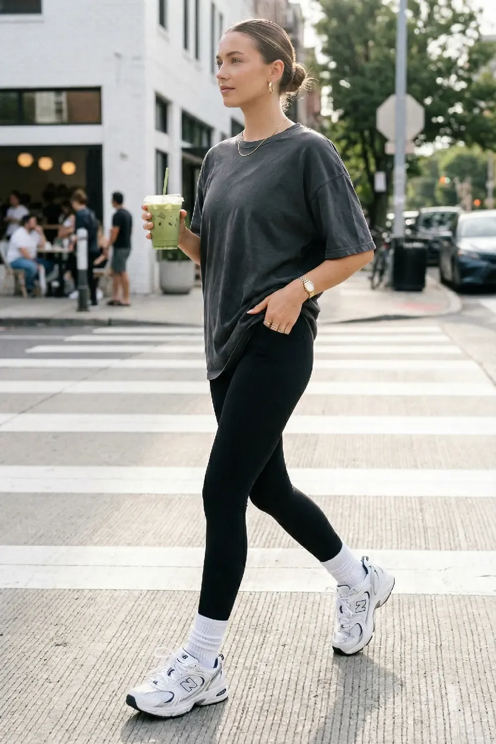 A stylish woman personifying the 'Model Off-Duty' look, captured in a candid street-style moment.